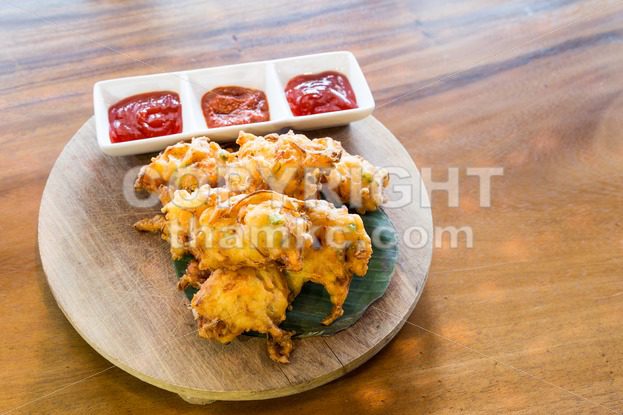 Cucur bawang or onion fritters, popular Malaysia food - ThamKC Royalty-Free Photos