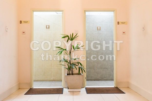 Entrances to men and ladies washroom - ThamKC Royalty-Free Photos