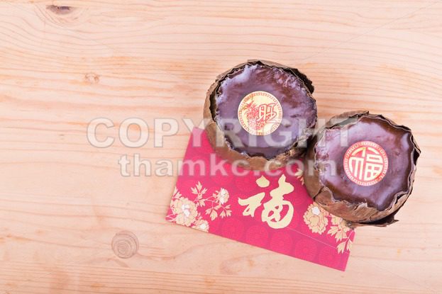 Glutinous rice cake with Good Luck in Chinese words - ThamKC Royalty-Free Photos