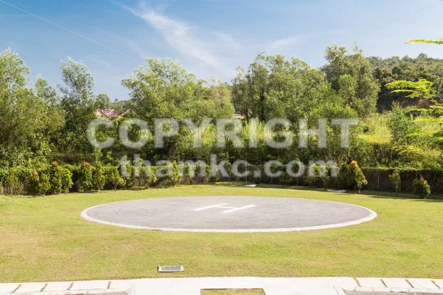 Helipad for helicopter landing within greenery - ThamKC Royalty-Free Photos