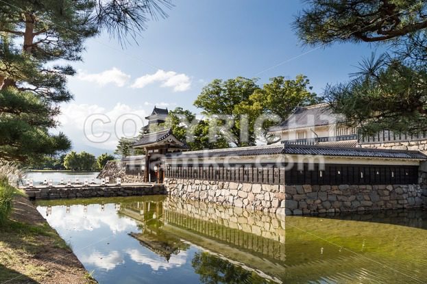 Matsumoto castle against blue sky during summer - ThamKC Royalty-Free Photos