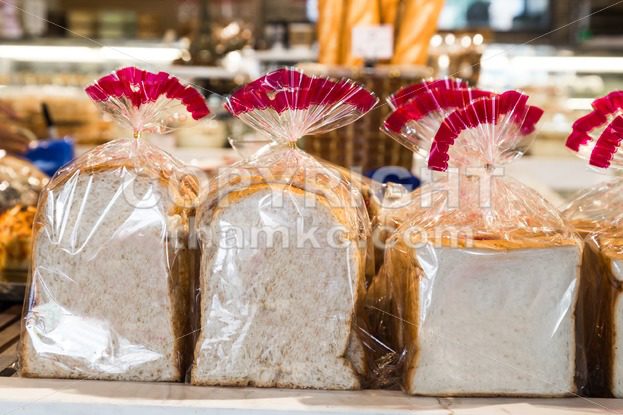 Organic gluten free bread in plastic wrapper - ThamKC Royalty-Free Photos
