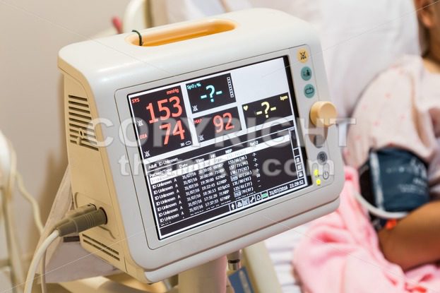 Patient monitoring machine in hospital ward - ThamKC Royalty-Free Photos