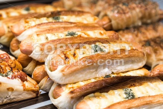 Tray of freshly baked gluten free bread with sausage cheese - ThamKC Royalty-Free Photos