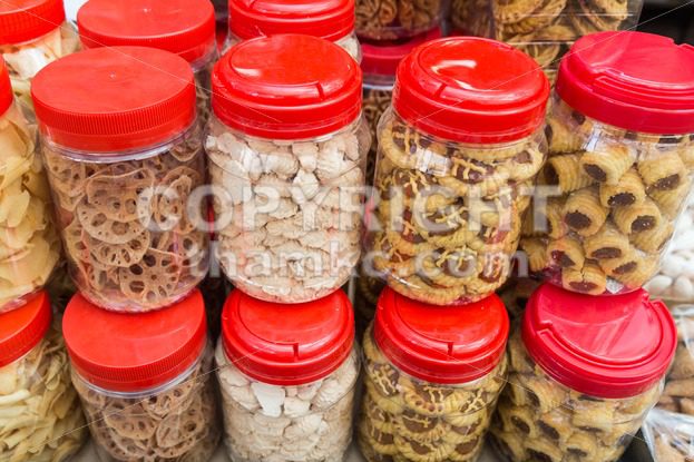 Variety Chinese New Year cookies in jars - ThamKC Royalty-Free Photos