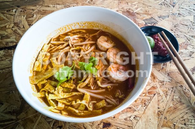 Authentic Sarawak laksa noodle with prawn and egg strips - ThamKC Royalty-Free Photos