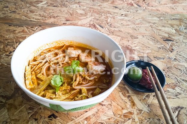 Authentic Sarawak laksa noodle with prawn and egg strips - ThamKC Royalty-Free Photos