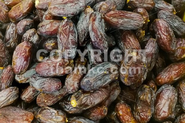 Close-up on dates at bazaar for Muslim iftar break fast - ThamKC Royalty-Free Photos