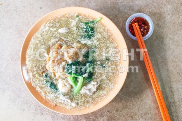 Plate of delicious fried kuey teow noodle Chinese Cantonese style - ThamKC Royalty-Free Photos