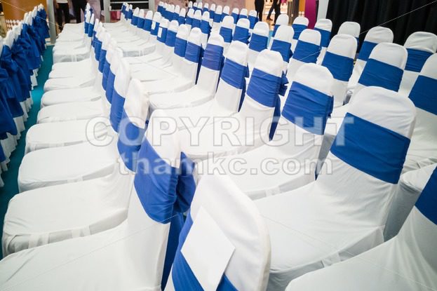 Rows of decorated banquet chairs - ThamKC Royalty-Free Photos