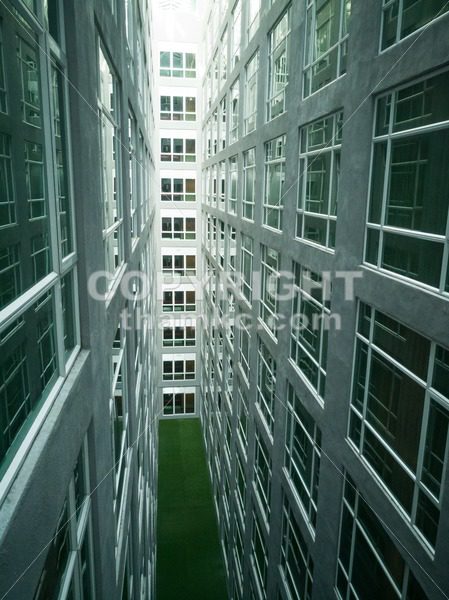 Series of narrow claustrophobia courtyard with glass window - ThamKC Royalty-Free Photos