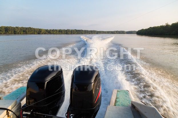 Wave generated by speed boat twin engine in river - ThamKC Royalty-Free Photos