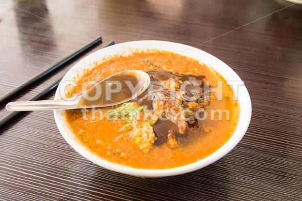 Asam laksa, popular Penang noodle with prawn paste - ThamKC Royalty-Free Photos