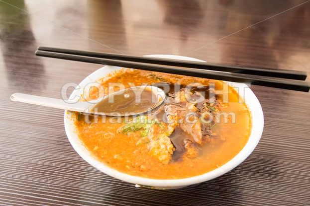 Asam laksa, popular Penang noodle with prawn paste - ThamKC Royalty-Free Photos