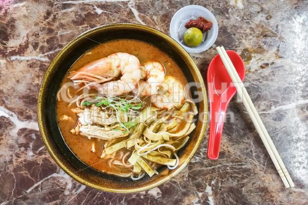 Authentic delicious Sarawak Laksa with big prawns - ThamKC Royalty-Free Photos