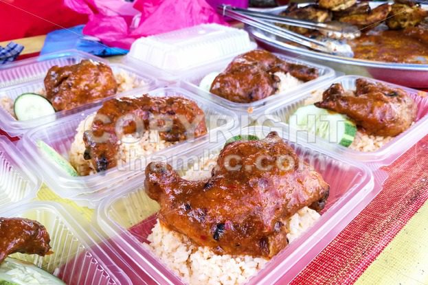 Ayam percik or grilled chicken, popular Malay food in Malaysia - ThamKC Royalty-Free Photos