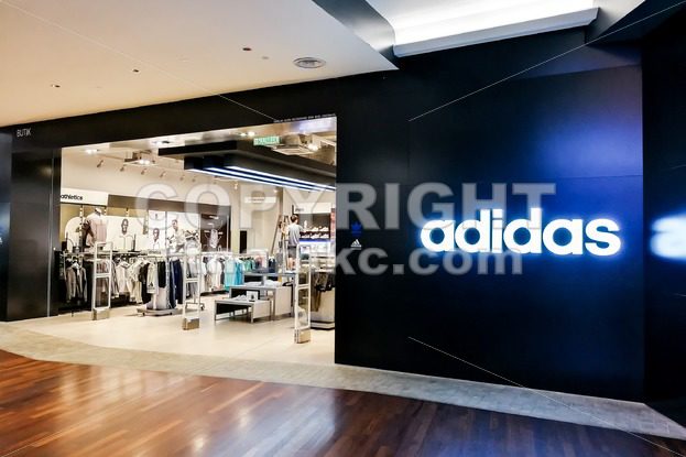 KUALA LUMPUR, Malaysia, June 25, 2017: Adidas AG is a German multinational corporation, headquartered in Herzogenaurach, Germany, that designs and manufactures shoes, clothing and accessories. - ThamKC Royalty-Free Photos