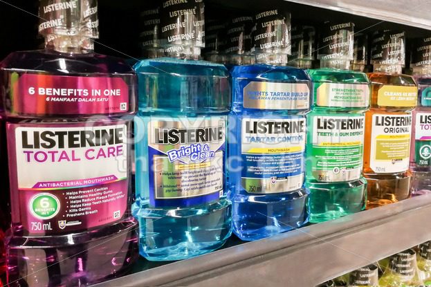 KUALA LUMPUR, Malaysia, June 25, 2017: Listerine is a brand of antiseptic mouthwash product. It is promoted with the slogan “Kills germs that cause bad breath”. - ThamKC Royalty-Free Photos