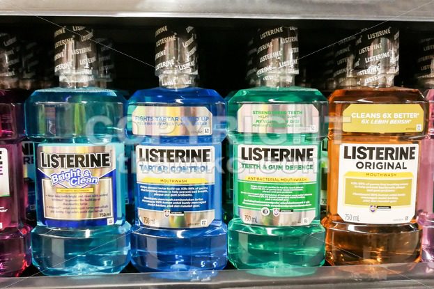 KUALA LUMPUR, Malaysia, June 25, 2017: Listerine is a brand of antiseptic mouthwash product. It is promoted with the slogan “Kills germs that cause bad breath”. - ThamKC Royalty-Free Photos