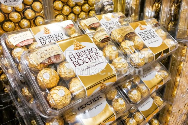 KUALA LUMPUR, Malaysia, June 3, 2017: Ferrero Rocher is a spherical chocolate produced by the Italian chocolatier Ferrero SpA. It is popular as festive gift. - ThamKC Royalty-Free Photos