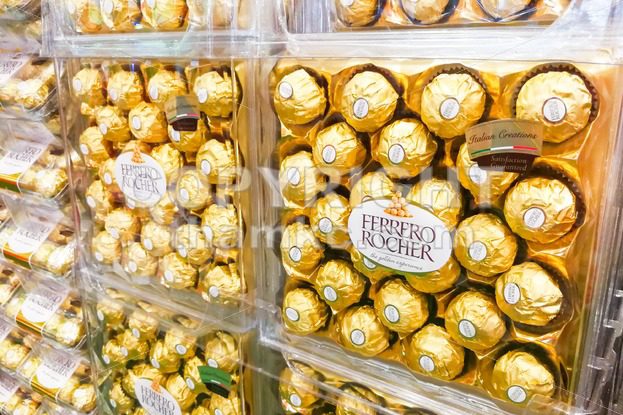 KUALA LUMPUR, Malaysia, June 3, 2017: Ferrero Rocher is a spherical chocolate produced by the Italian chocolatier Ferrero SpA. It is popular as festive gift. - ThamKC Royalty-Free Photos
