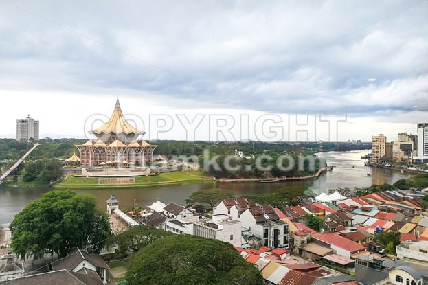 KUCHING, Malaysia, June 25, 2017:  Overview of Kuching city waterfront, popular tourism destination in Sarawak. State Legislative Assembly building in foreground - ThamKC Royalty-Free Photos