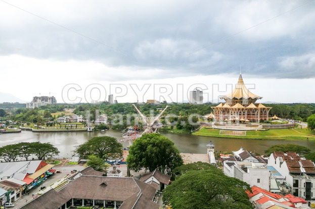 KUCHING, Malaysia, June 25, 2017:  Overview of Kuching city waterfront, popular tourism destination in Sarawak. State Legislative Assembly building in foreground - ThamKC Royalty-Free Photos