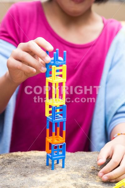 Kids playing the stacking chairs game during party - ThamKC Royalty-Free Photos
