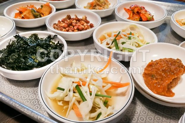 Korean meal side dishes vegetable, kinchi, groundnuts, garlic, bean sprout - ThamKC Royalty-Free Photos