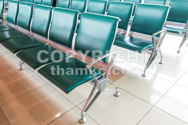Rows of empty chairs at waiting area - ThamKC Royalty-Free Photos