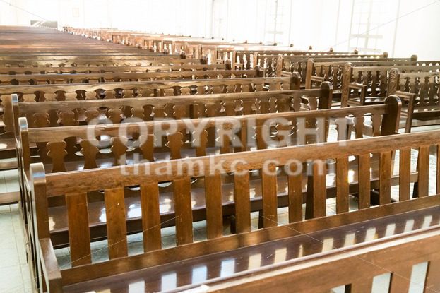 Rows of empty pew benches inside chapel church - ThamKC Royalty-Free Photos