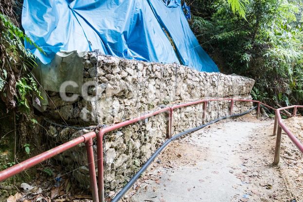 Slope and earth retention wall management in tropical hilly terrain - ThamKC Royalty-Free Photos