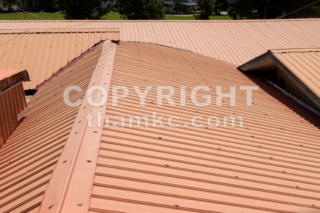 Strip of running metal roof of a building - ThamKC Royalty-Free Photos