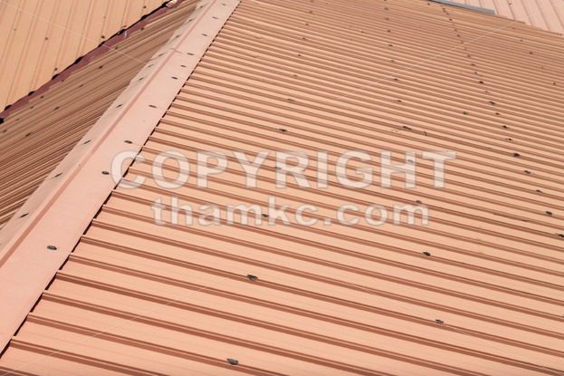 Strip of running metal roof of a building - ThamKC Royalty-Free Photos