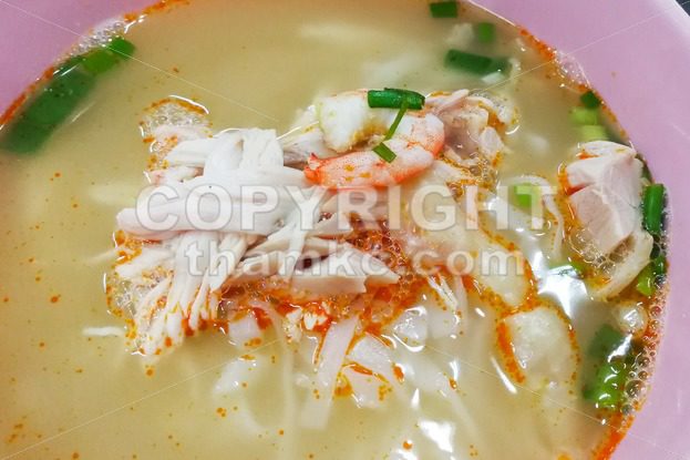 Close-up on popular delicious Malaysia Ipoh sliced chicken noodle soup - ThamKC Royalty-Free Photos