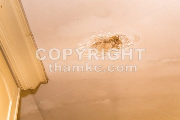 Roof leakages results damage ugly corrosion on plaster ceiling - ThamKC Royalty-Free Photos