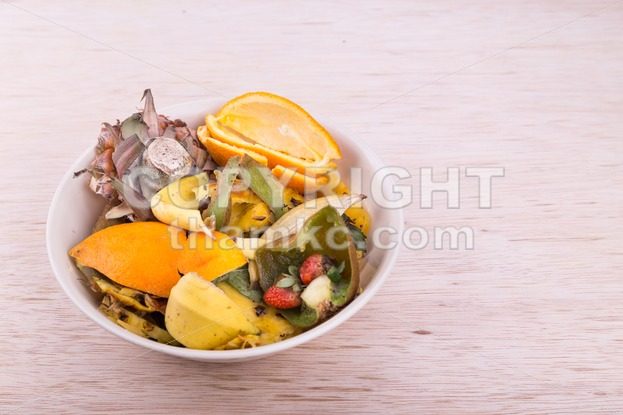 Bowl of household vegetable and fruits refuse collected for compost - ThamKC Royalty-Free Photos