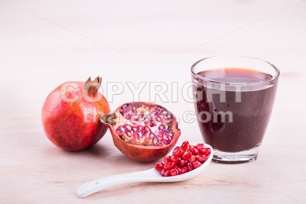 Organic Pomegranate juice with high anti-oxidant good for health - ThamKC Royalty-Free Photos