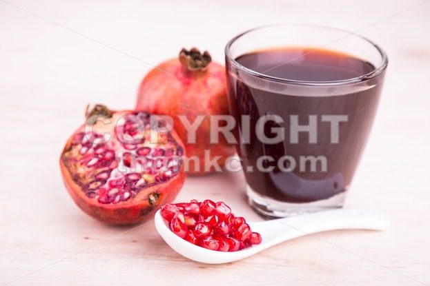 Organic Pomegranate juice with high anti-oxidant good for health - ThamKC Royalty-Free Photos
